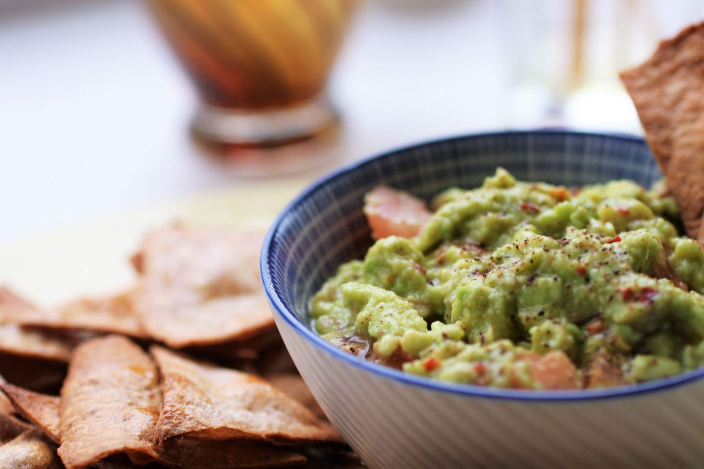 close up of a pot of guacamole