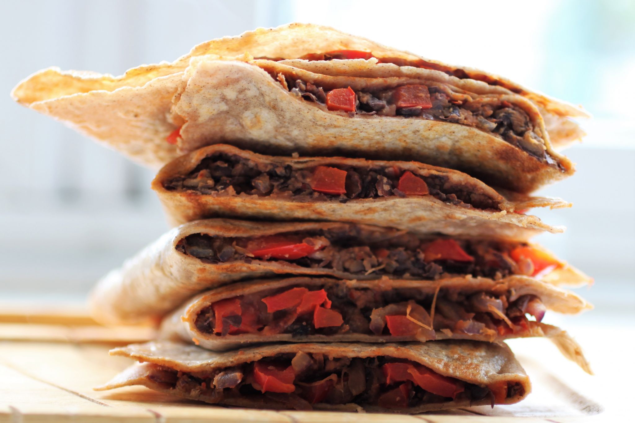 bean quesadillas cut open, close up of the filling