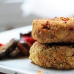 sundried tomato falafel burger patties on a white plate