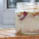 nectarine parfait in glass jar, close up
