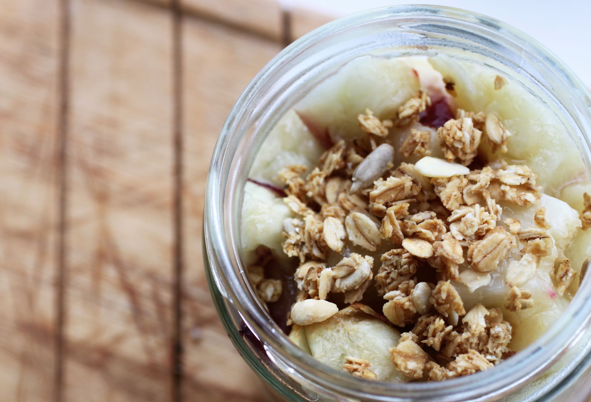 shot of the top of the parfait pot to see the fruit and granola