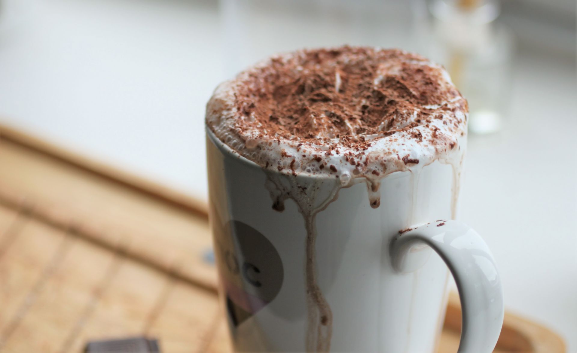 mug of vegan orange hot chocolate with the toppings