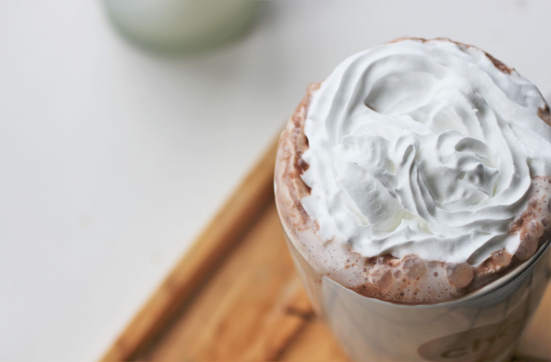close up shot of vegan cream on top of the mug