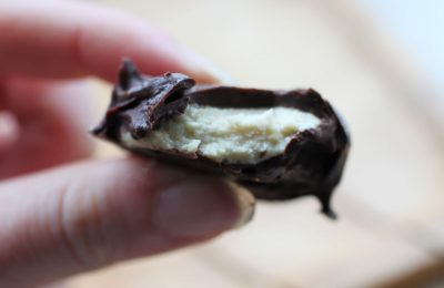 vegan peppermint cream bitten into to show the inside