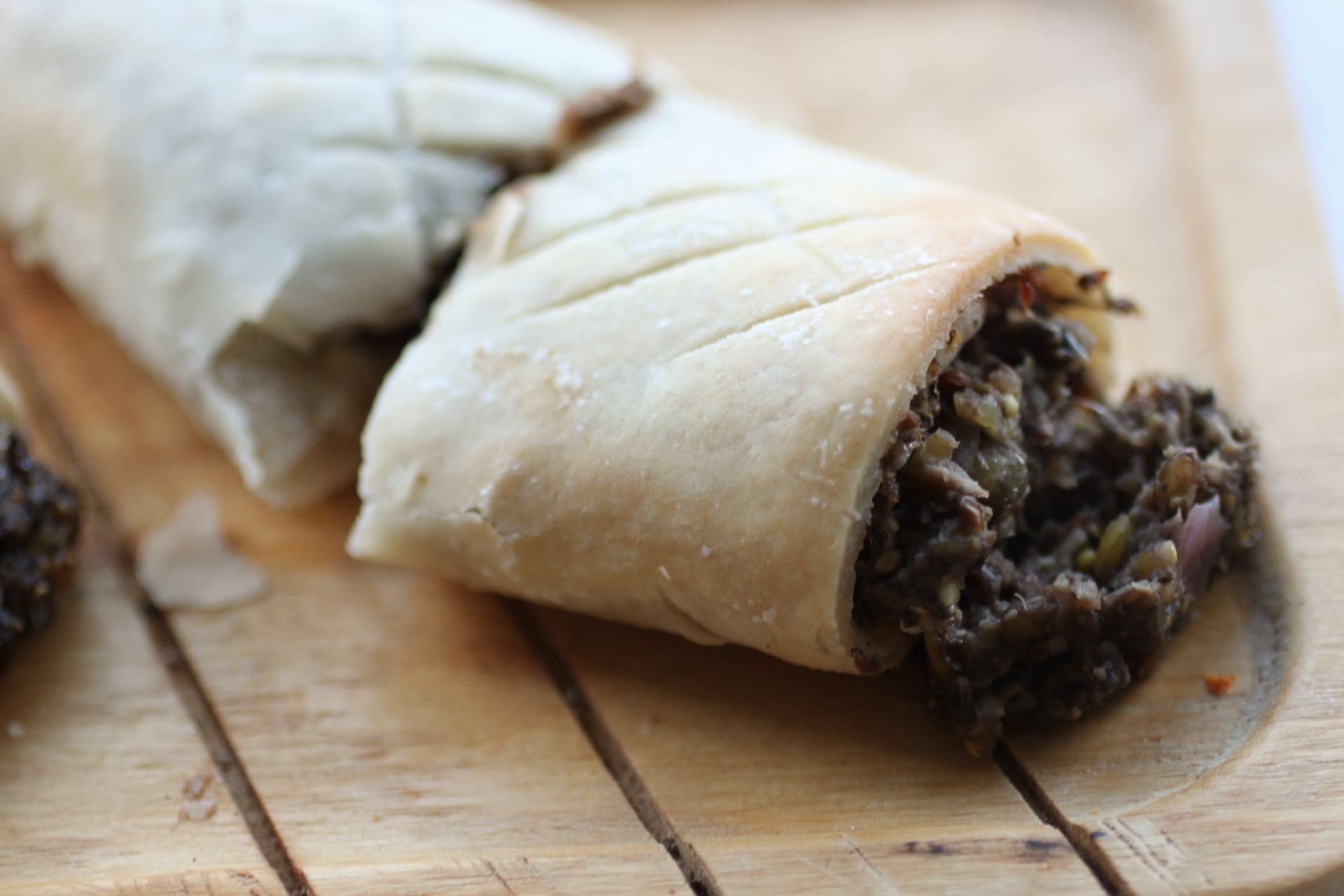 gluten free vegan sausage roll cut in half