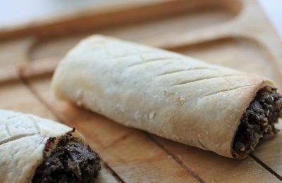 gluten free vegan sausaage rolls on a wooden tray