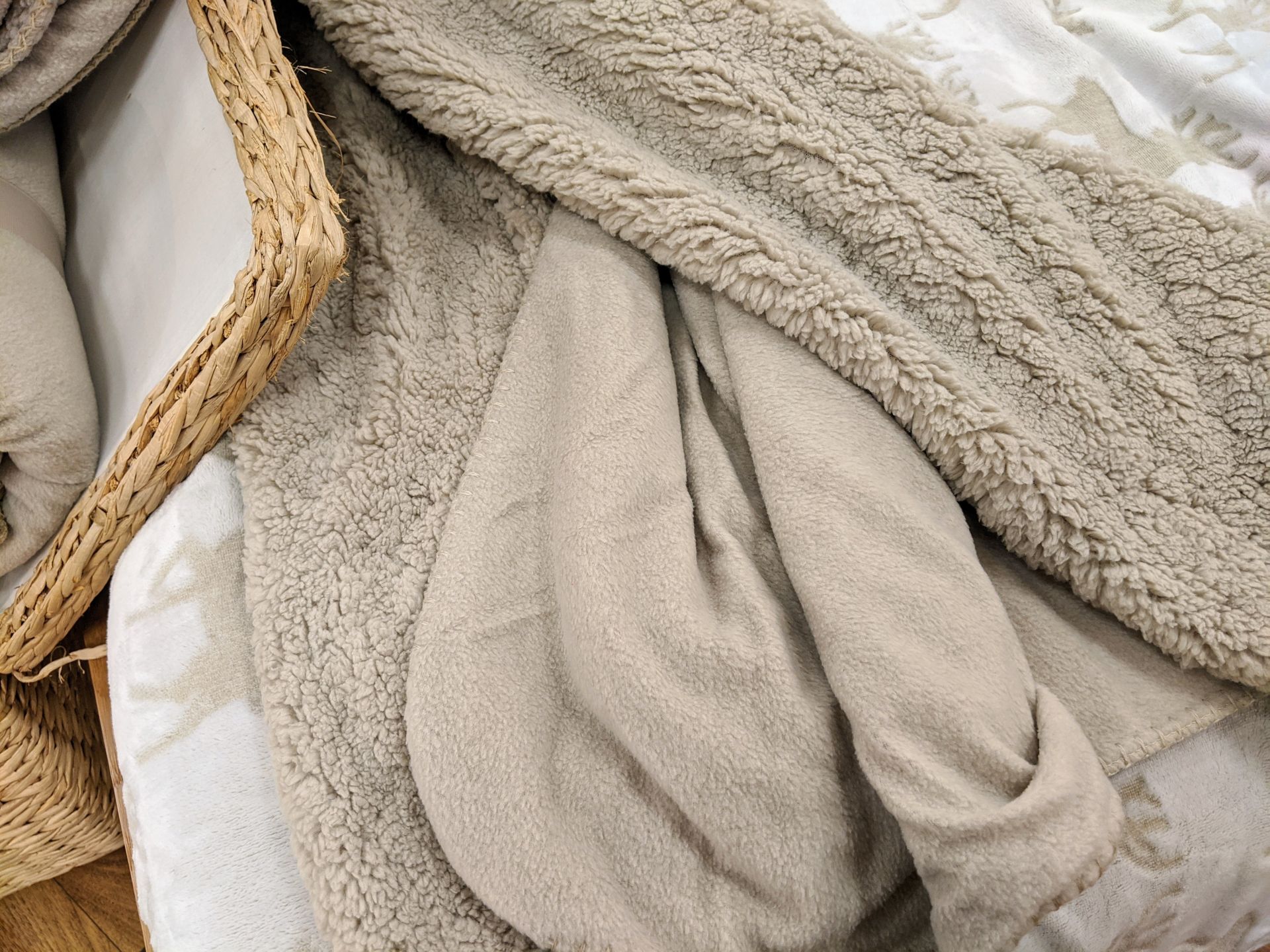 fleeced blanket on a bed