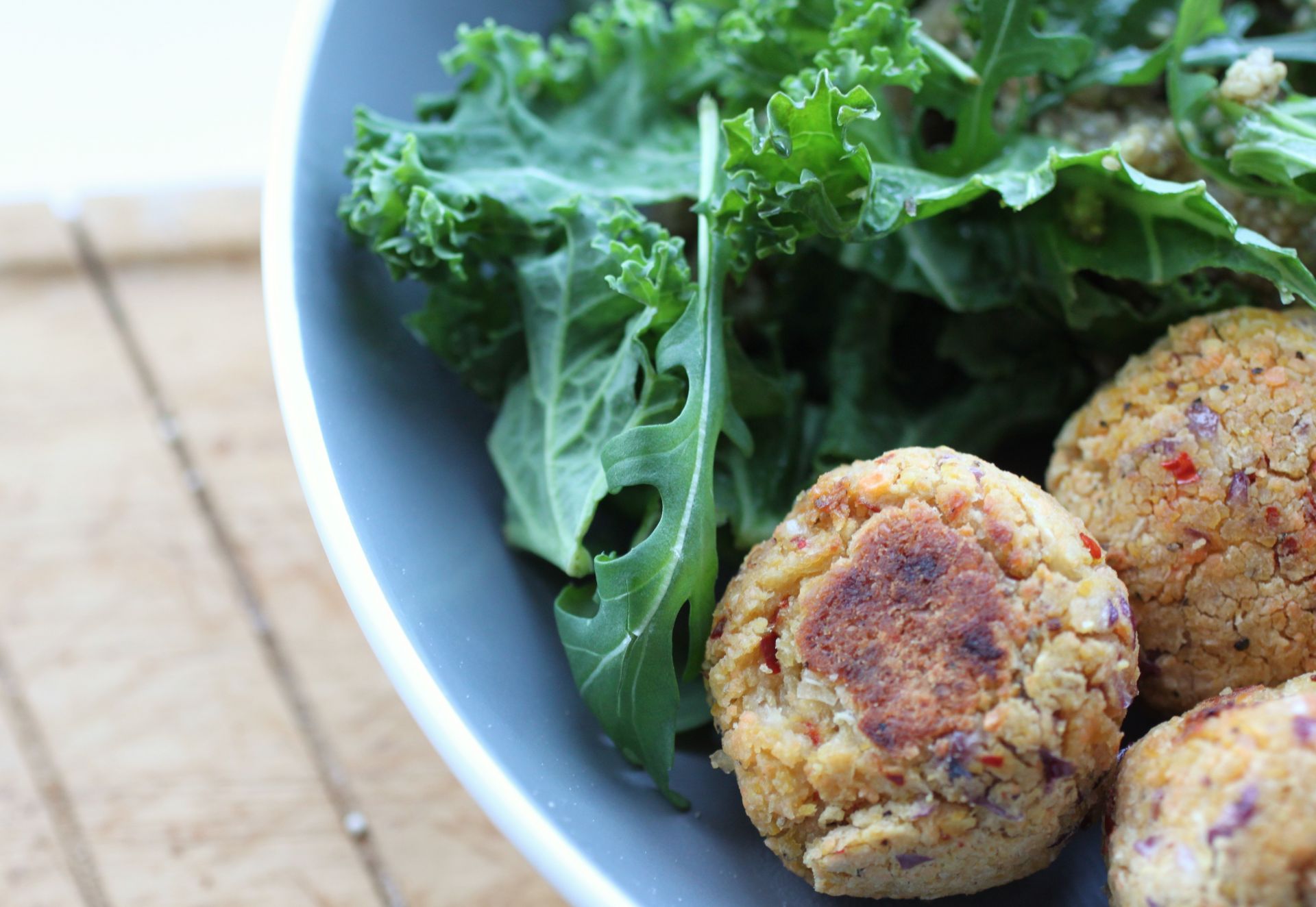 close up of the roasted falafels in the salad bowl
