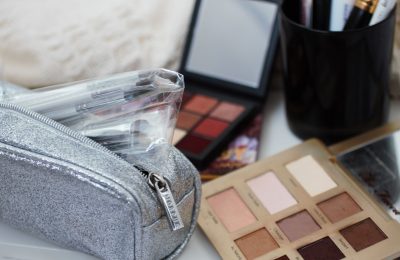 Morphe x Jaclyn Hill brshes shown in their packaging with some other makeup products in the background