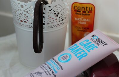 a couple of curly girl haircare products I picked up, placed in my bathroom