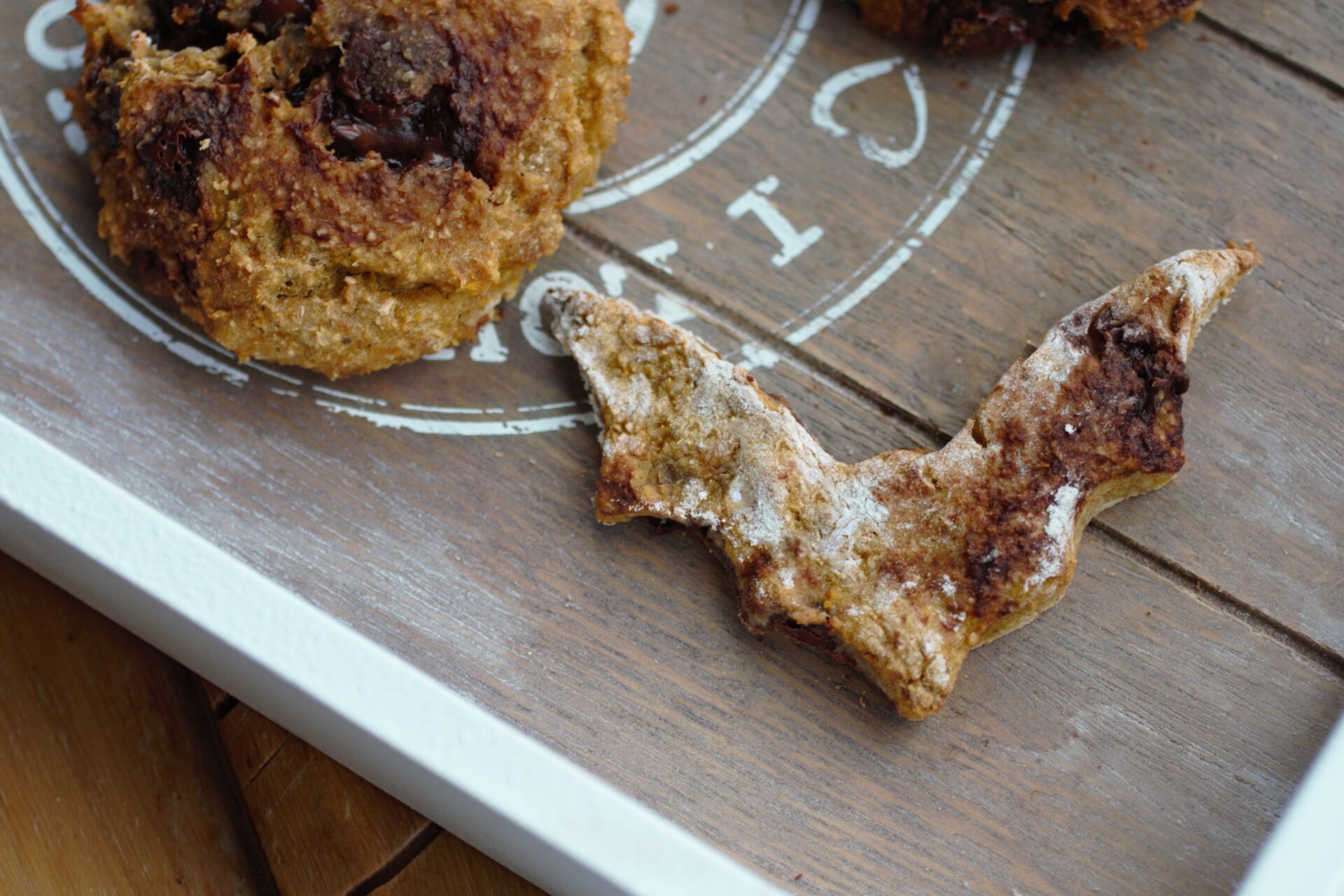 a bat shaped pumpkin cookie