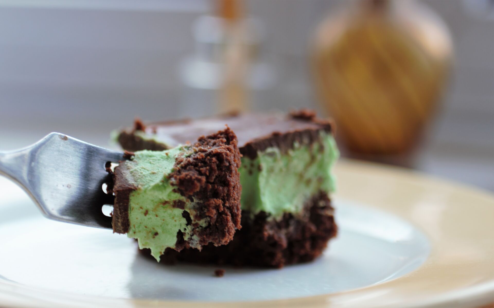 close up of a fork with some brownie on