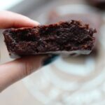brownie held up to show the texture inside