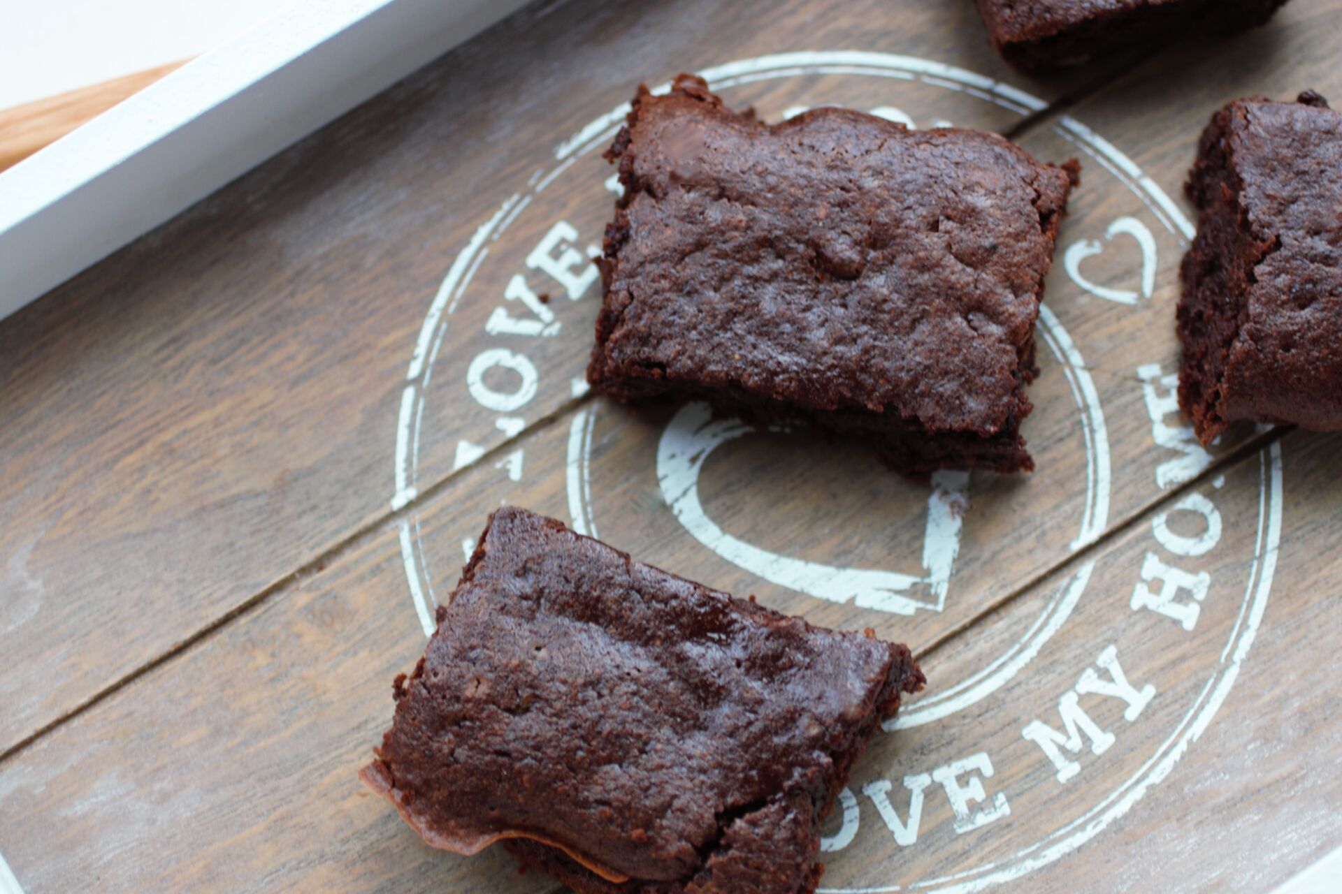 vegan chocolate orange brownies on a wooden tray