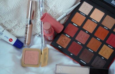 a selection of some of my 2020 beauty favourites on a white sheet