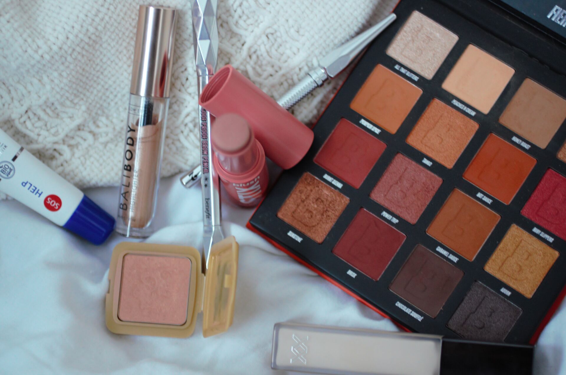 a selection of some of my 2020 beauty favourites on a white sheet