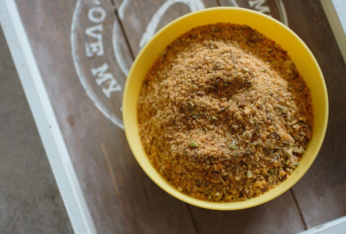 plastic bowl filled with the best gluten free breadcrumbs mix