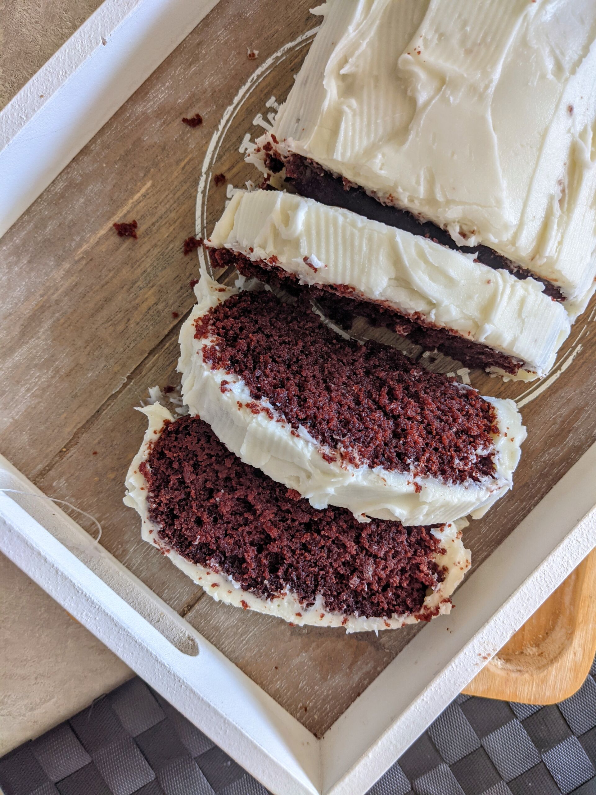 red velvet loaf recipe, sliced with some sliced placed to the side