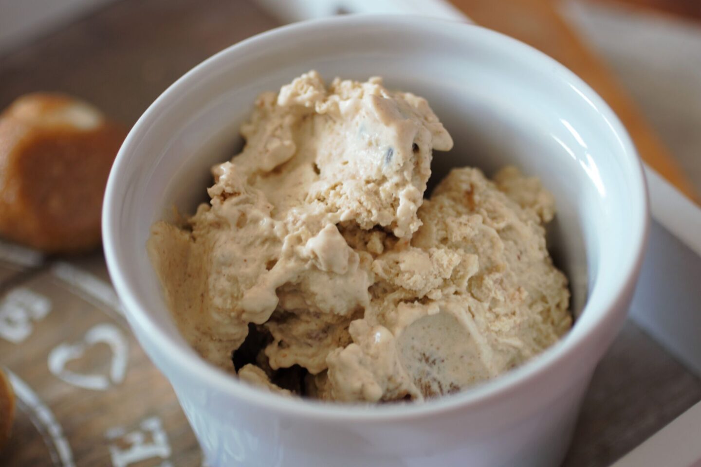 a small white pot of vegan cookie dough ice cream