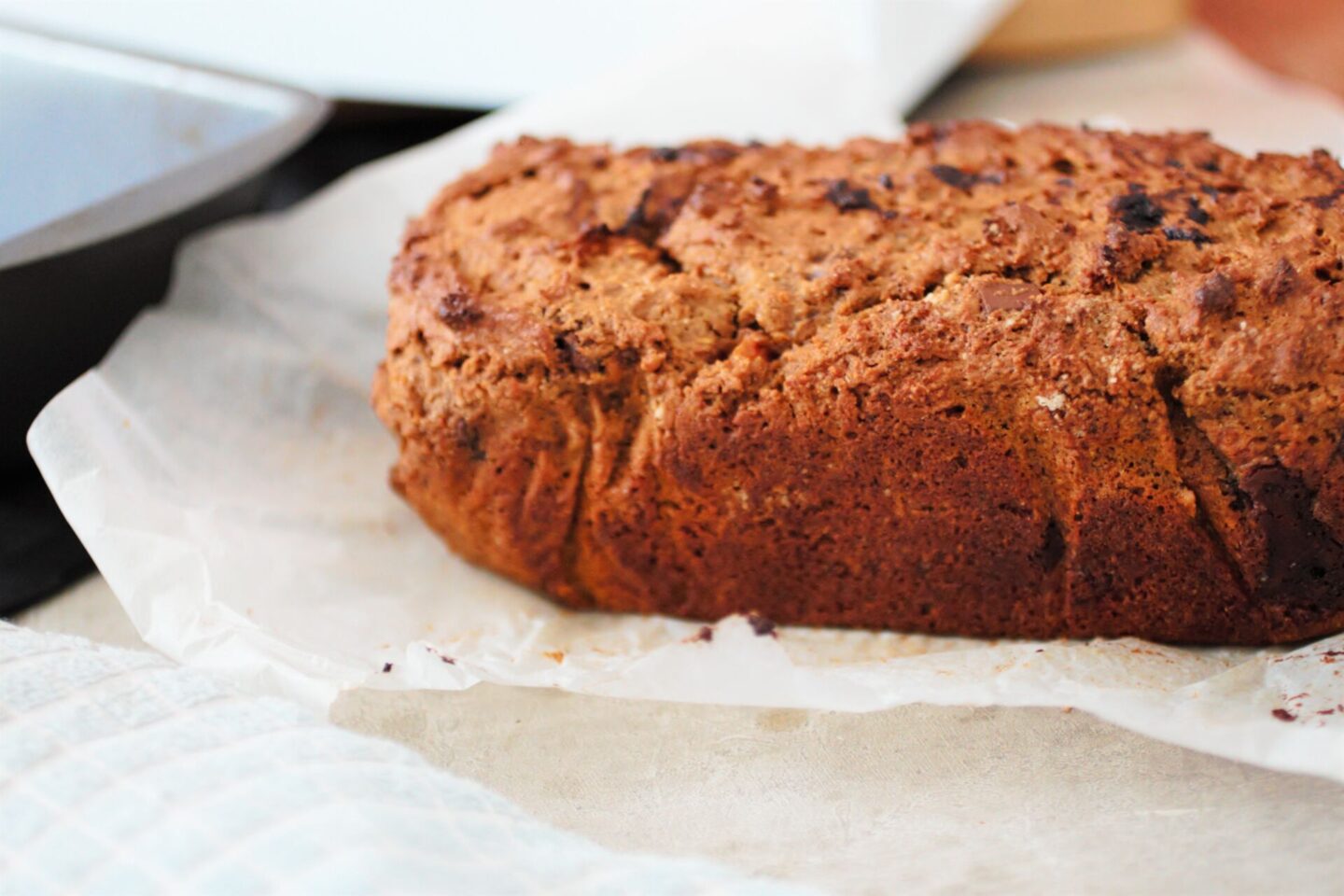chocolate chip pumpkin loaf, freshly baked. removed from the baking paper