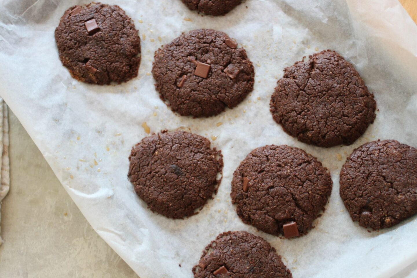 a baking tray of coffee cookies fresh from the oven