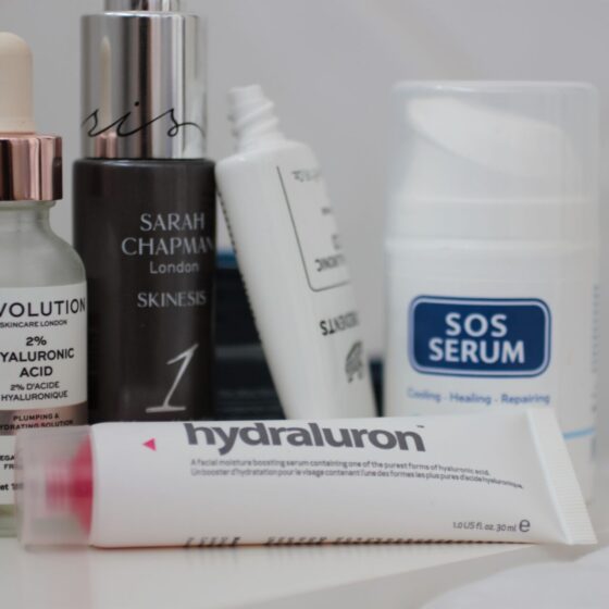 a selection of cruelty free hydrating skincare placed on a white sheet