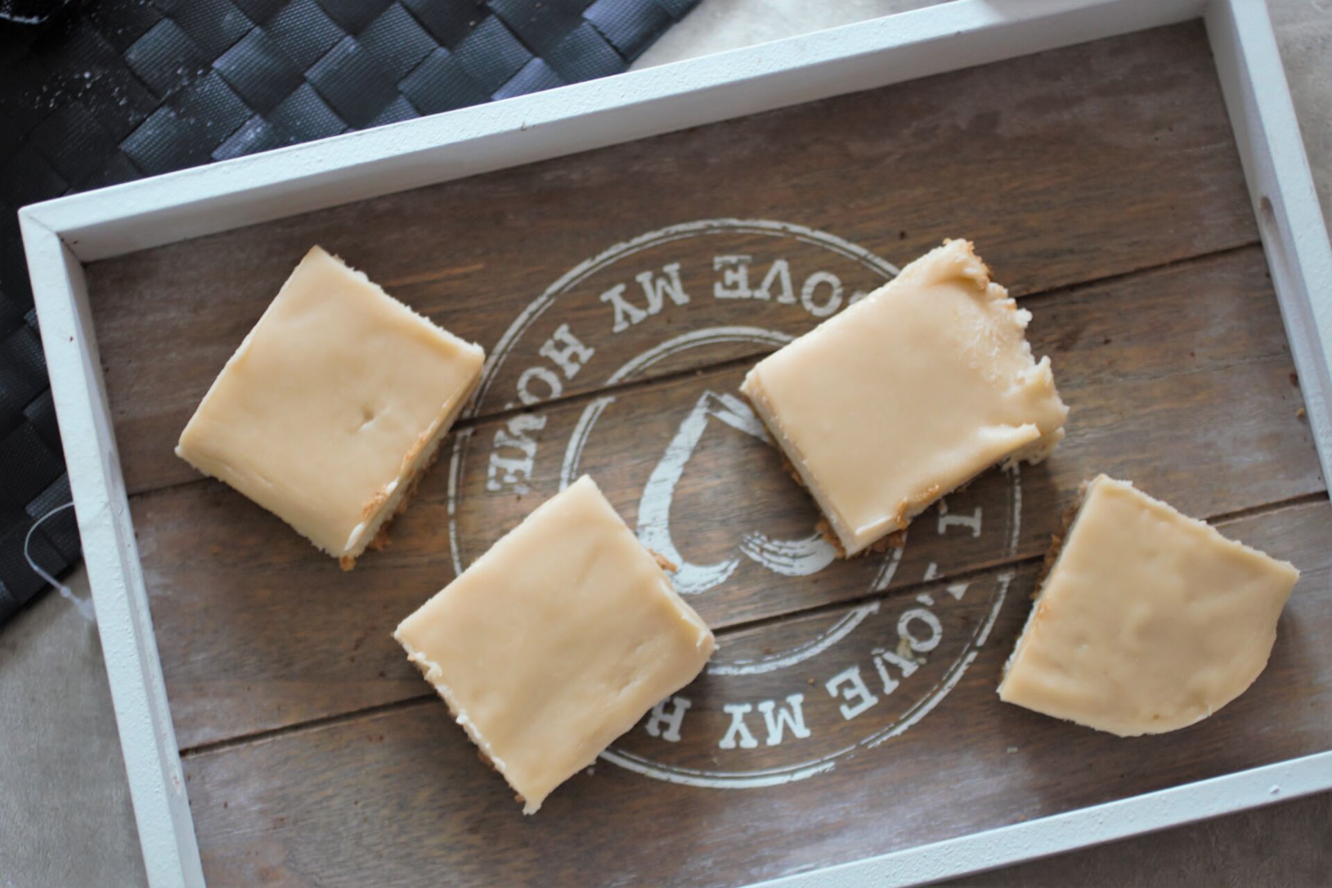 peppermint white chocolate cheesecake slices on a grey wooden board