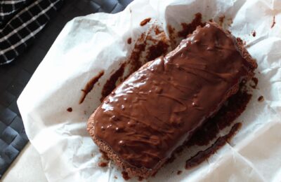 the whole chocolate orange loaf on a sheet of white greaseproof paper