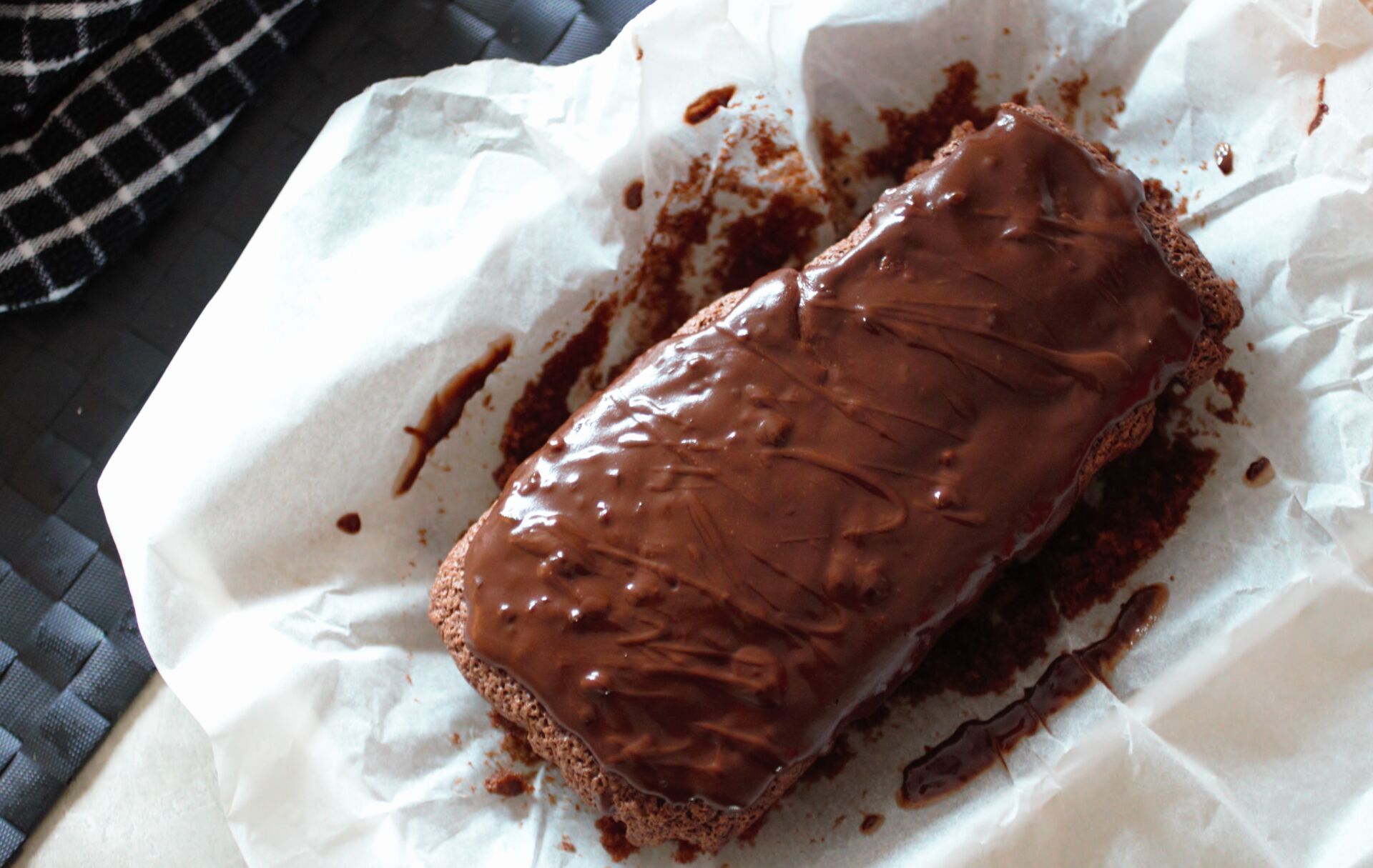 the whole chocolate orange loaf on a sheet of white greaseproof paper