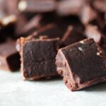 a tray of small avocado fudge chocolates