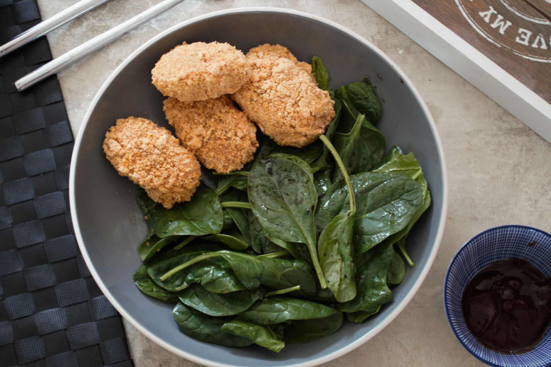 bowl of carrot nuggets and a salad