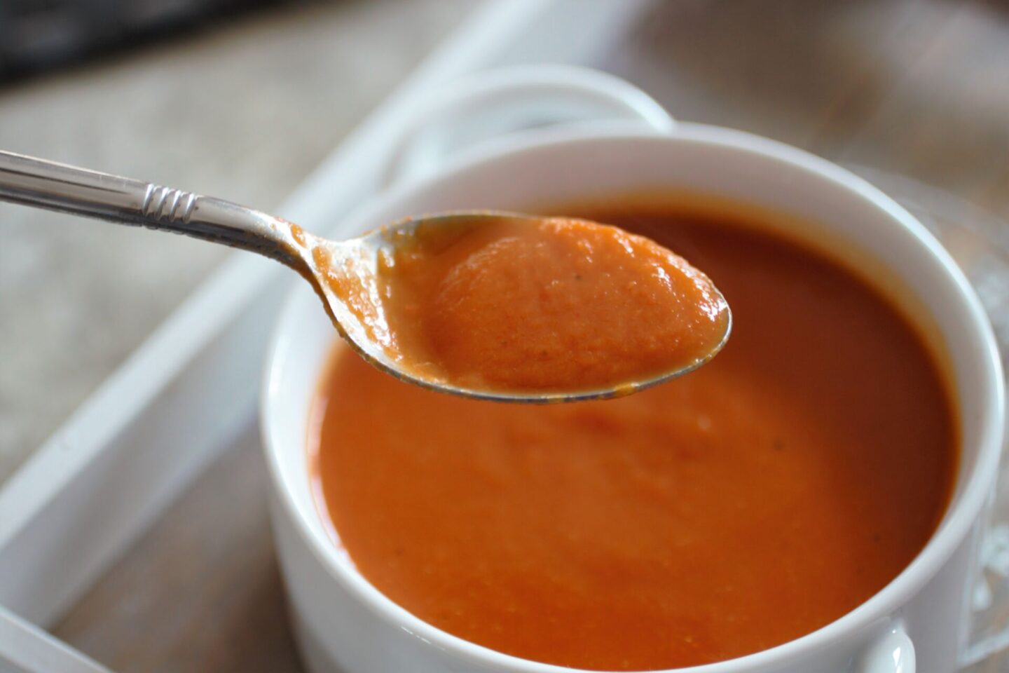 a spoon of soup to show the slightly thicker texture