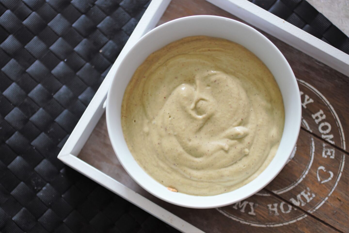apple pie smoothie bowl recipe, in a white bowl, before the toppings were added 