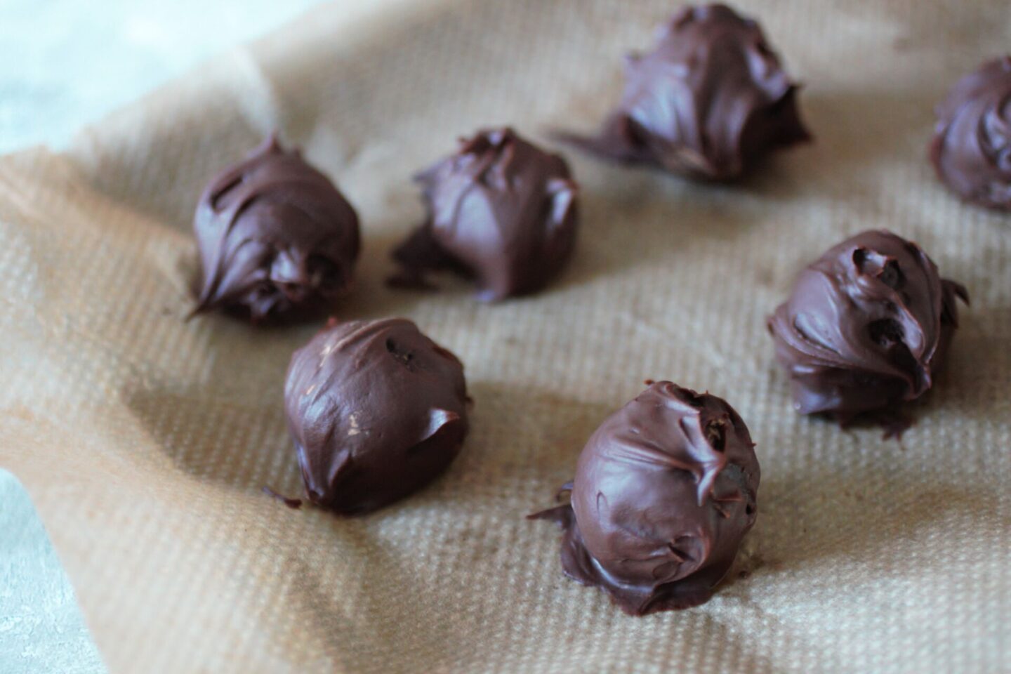 a tray of set vegan chocolate truffles