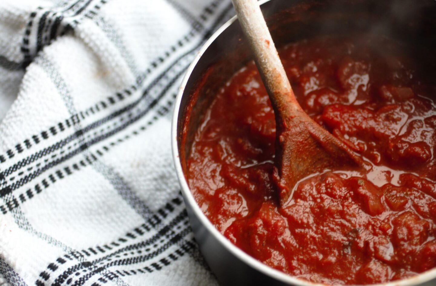 a pan of red wine pasta sauce