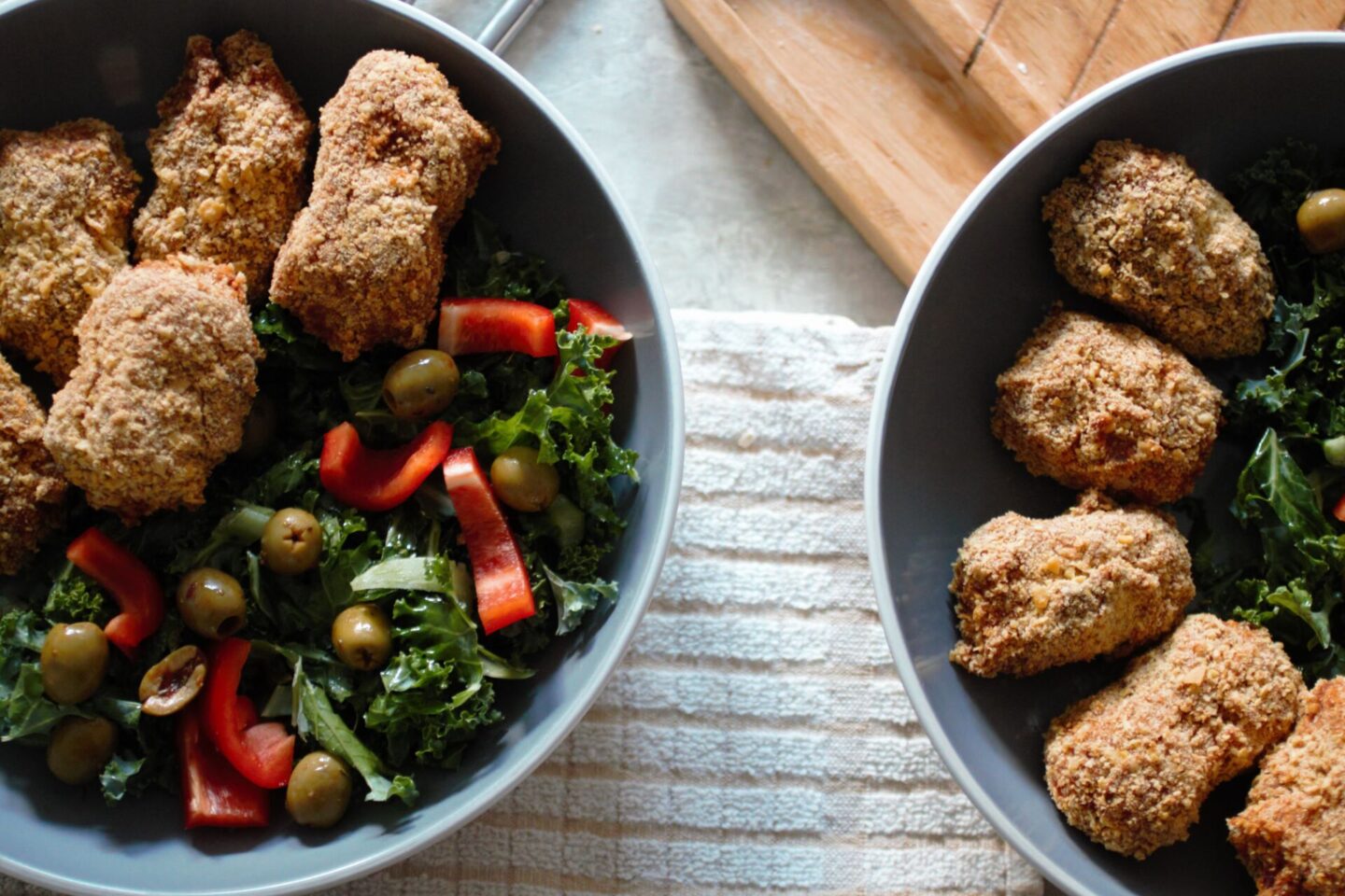 two bowls of sweet potato nuggets on a table