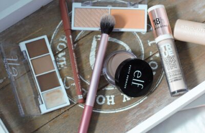 a wooden tray covered in £20 makeup challenge products