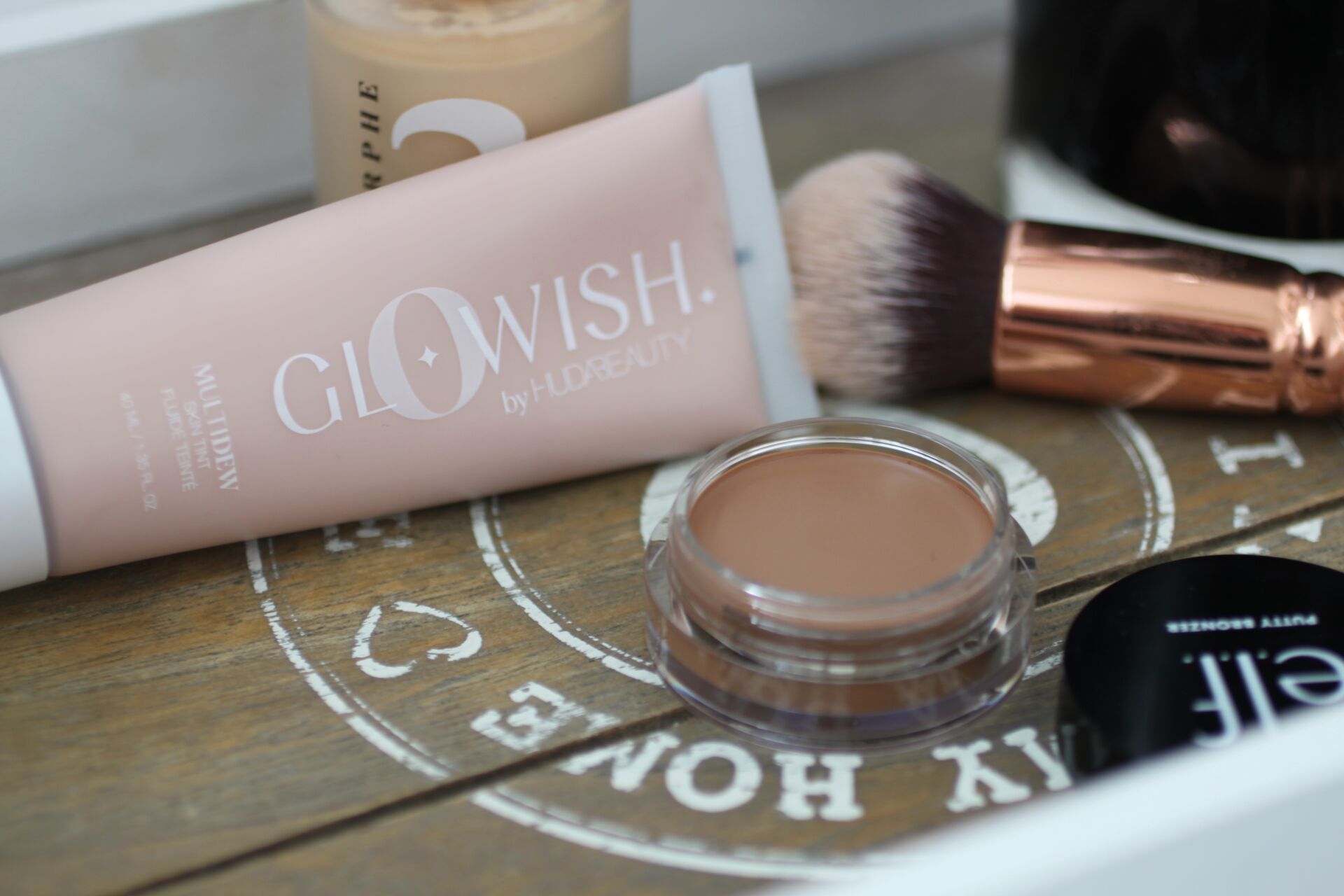birthday beauty haul - a few products on a wooden tray
