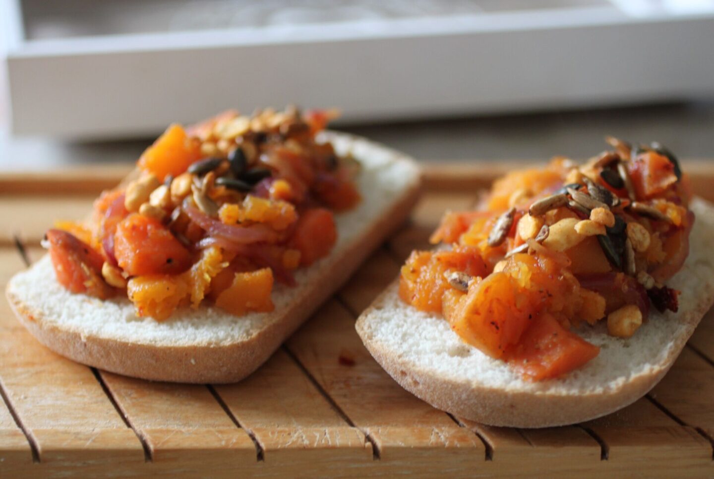 caramelised squash toast on a wooden board