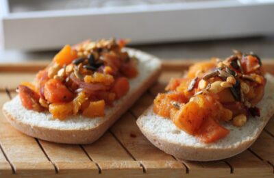caramelised squash toast on a wooden board