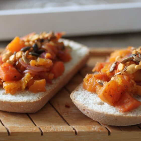 caramelised squash toast on a wooden board
