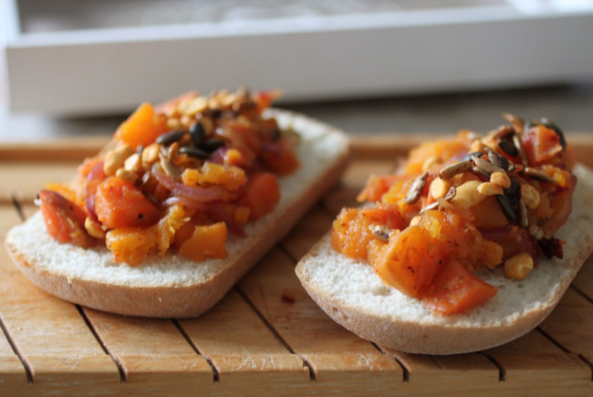 caramelised squash toast on a wooden board