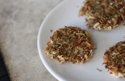 some crispy celeriac hash , baked and fried, on a white plate