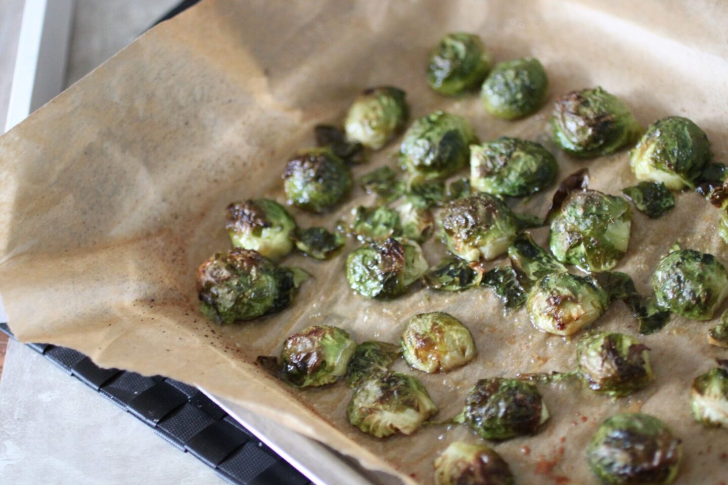 tray of freshly roasted crispy maple sprouts