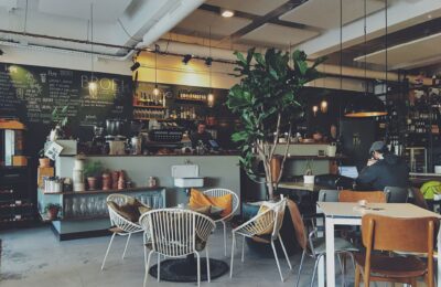 cafe counter and some chairs and tables