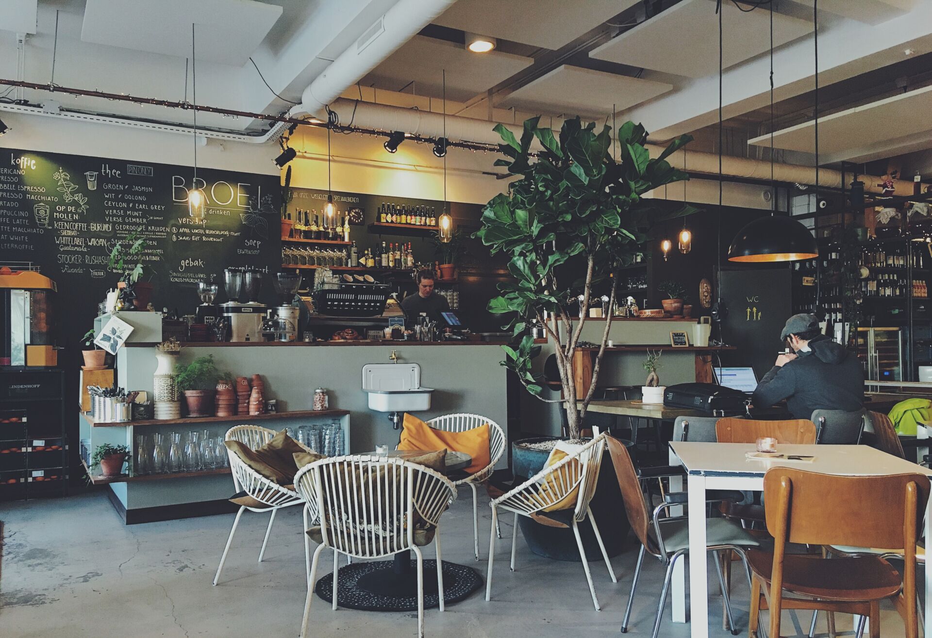 cafe counter and some chairs and tables