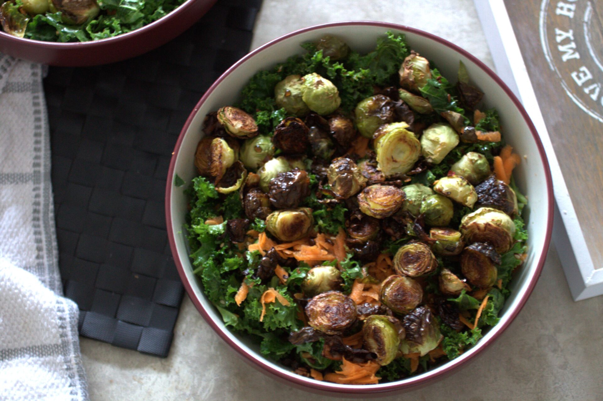 bowl of winter vegetable salad in a large pasta bowl placed on a dining table