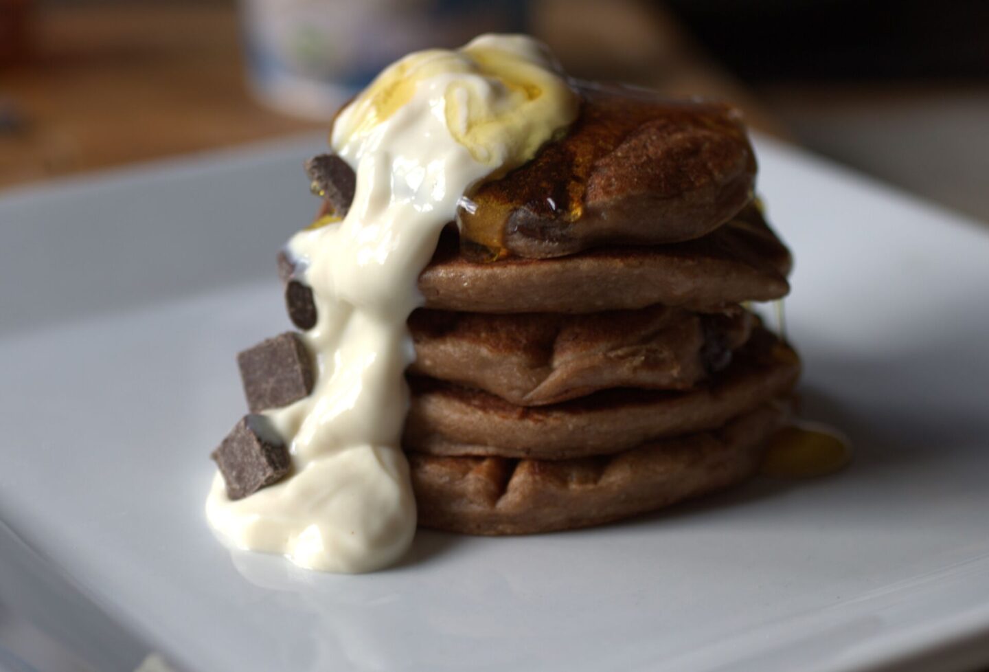 a close up shot of a stack of protein pancakes