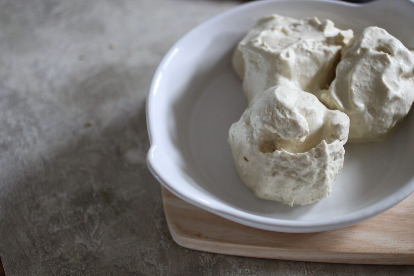3 scoops of soft serve vegan high protein ice cream recipe in a white dish