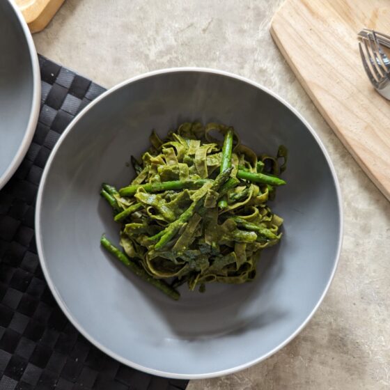 lemon asparagus fettuccine on a table, shot from above